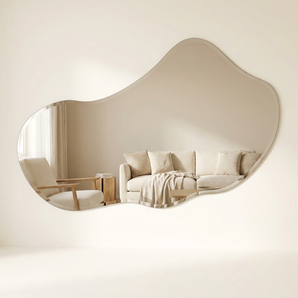 Frameless asymmetrical puddle wall mirror in clear silver glass