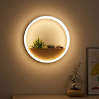 White ring shelf wall lamp on a living room accent wall with warm glow