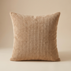 Beige corduroy cushion cover layered on a neutral linen sofa