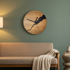 Natural wood cracked-split wall clock with minimalist face, mounted on a living room wall above a sofa