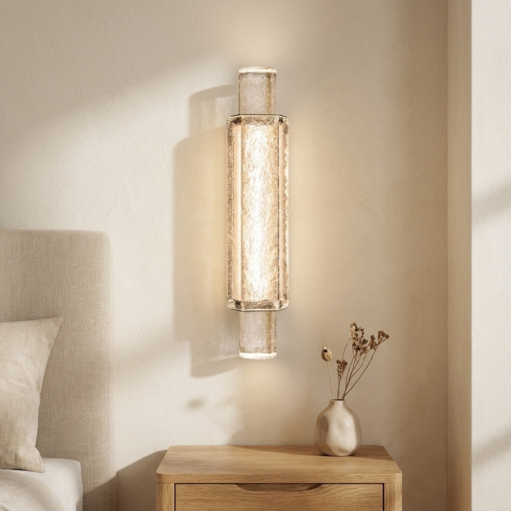 Bubbled glass column wall sconce with warm LED glow inside the center bar