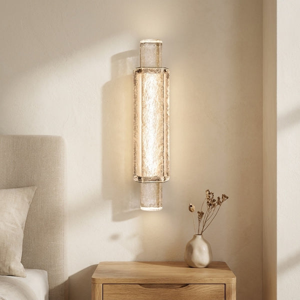 Bubbled glass column wall sconce with warm LED glow inside the center bar