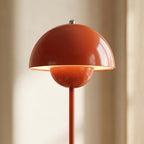 Slim straight pole and rounded base of the glossy red-orange mushroom floor lamp