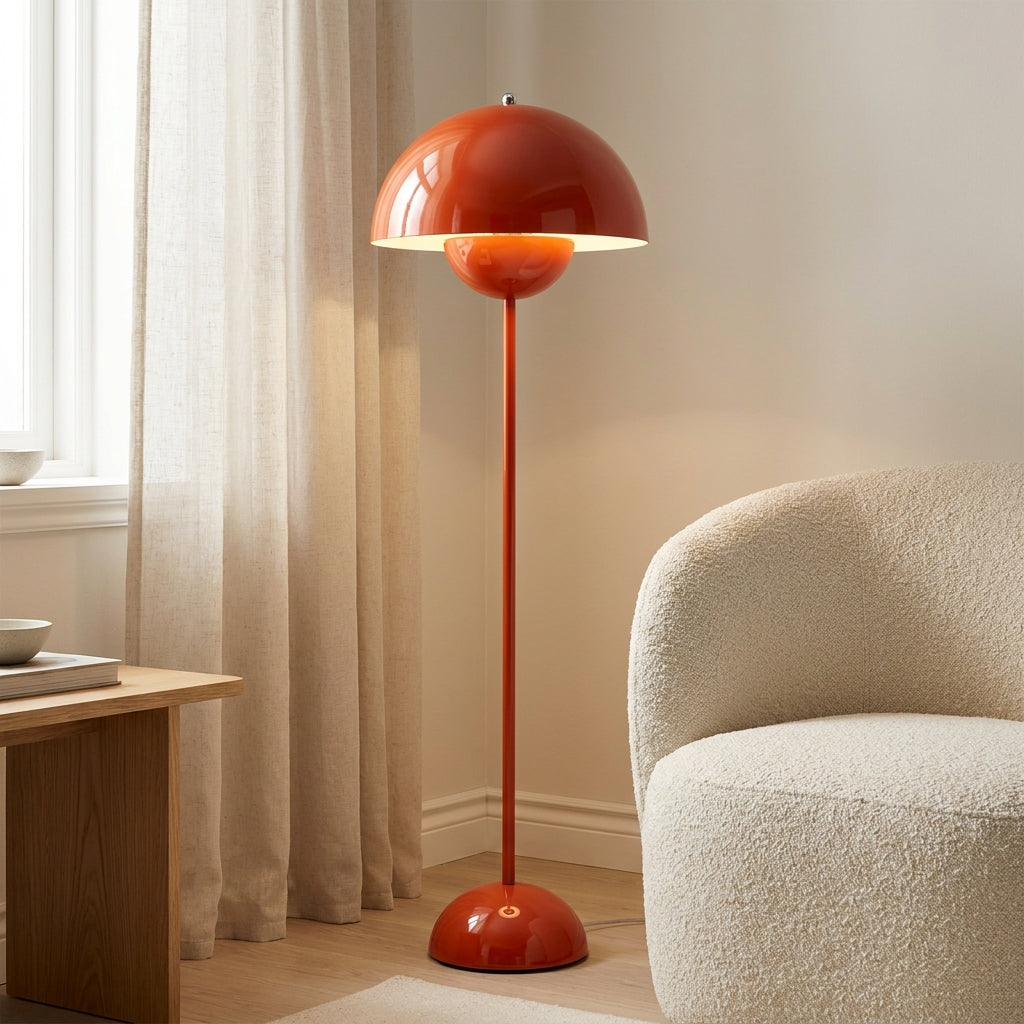 Red-orange mushroom-dome floor lamp as a sculptural accent in a modern interior