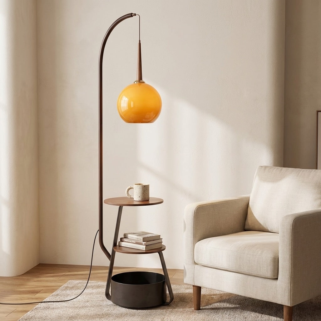 Amber glass globe shade glowing on the arched floor lamp