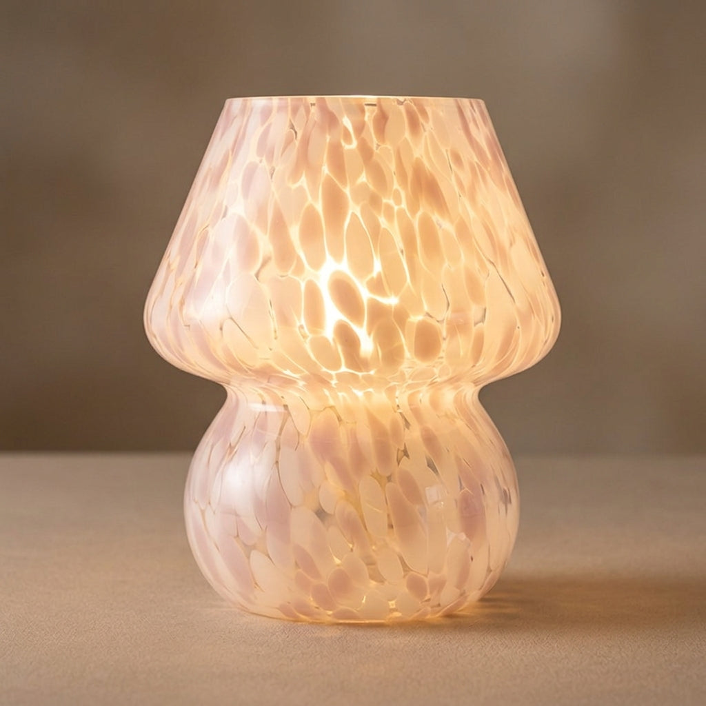 Pink and white speckled confetti glass mushroom table lamp glowing warmly