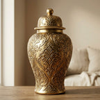 gold-tone ginger jar vase with its domed lid removed showing the open vase mouth