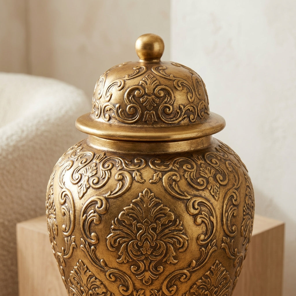 Detail of the domed lid knob finial on the antique-gold ginger jar