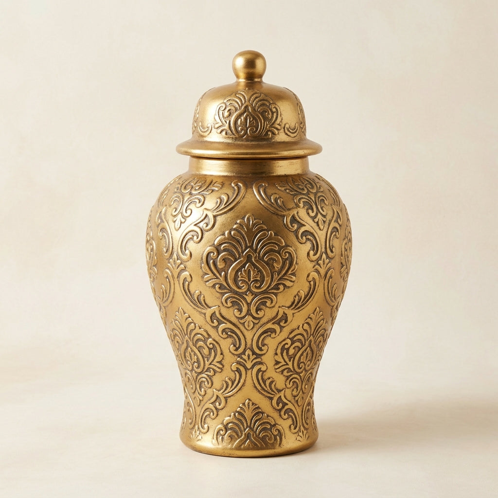 Antique-gold ginger jar styled on a dresser with stacked books in a calm corner