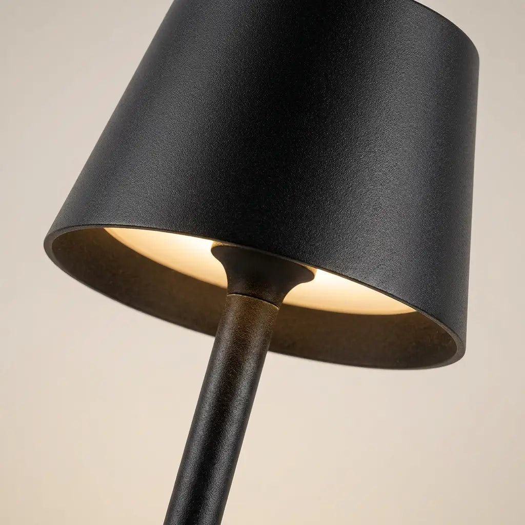 Cordless LED touch table lamp — material and form close-up
