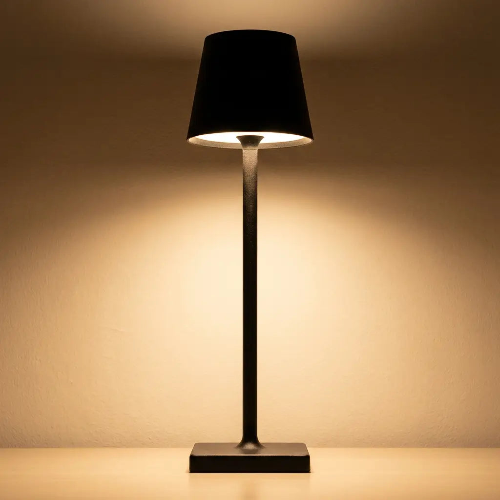 Cordless LED touch table lamp — dramatic low-angle hero shot