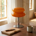 Pastel macaron glass table lamp — on minimal walnut desk