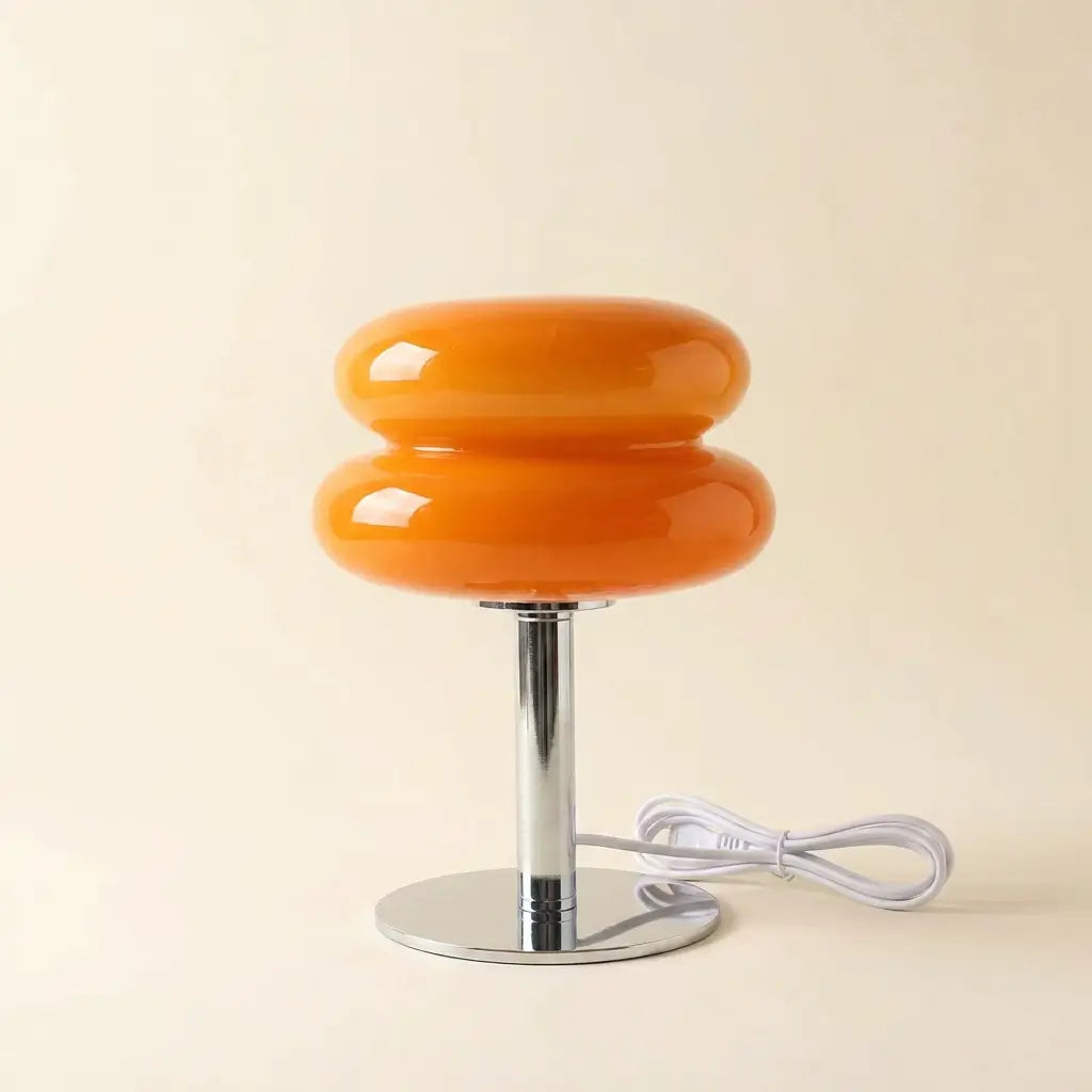 Pastel macaron glass table lamp — on warm cream studio backdrop