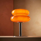 Pastel macaron glass table lamp — dramatic low-angle hero shot
