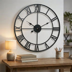 3D Roman numeral metal wall clock — in calm home office above wooden desk