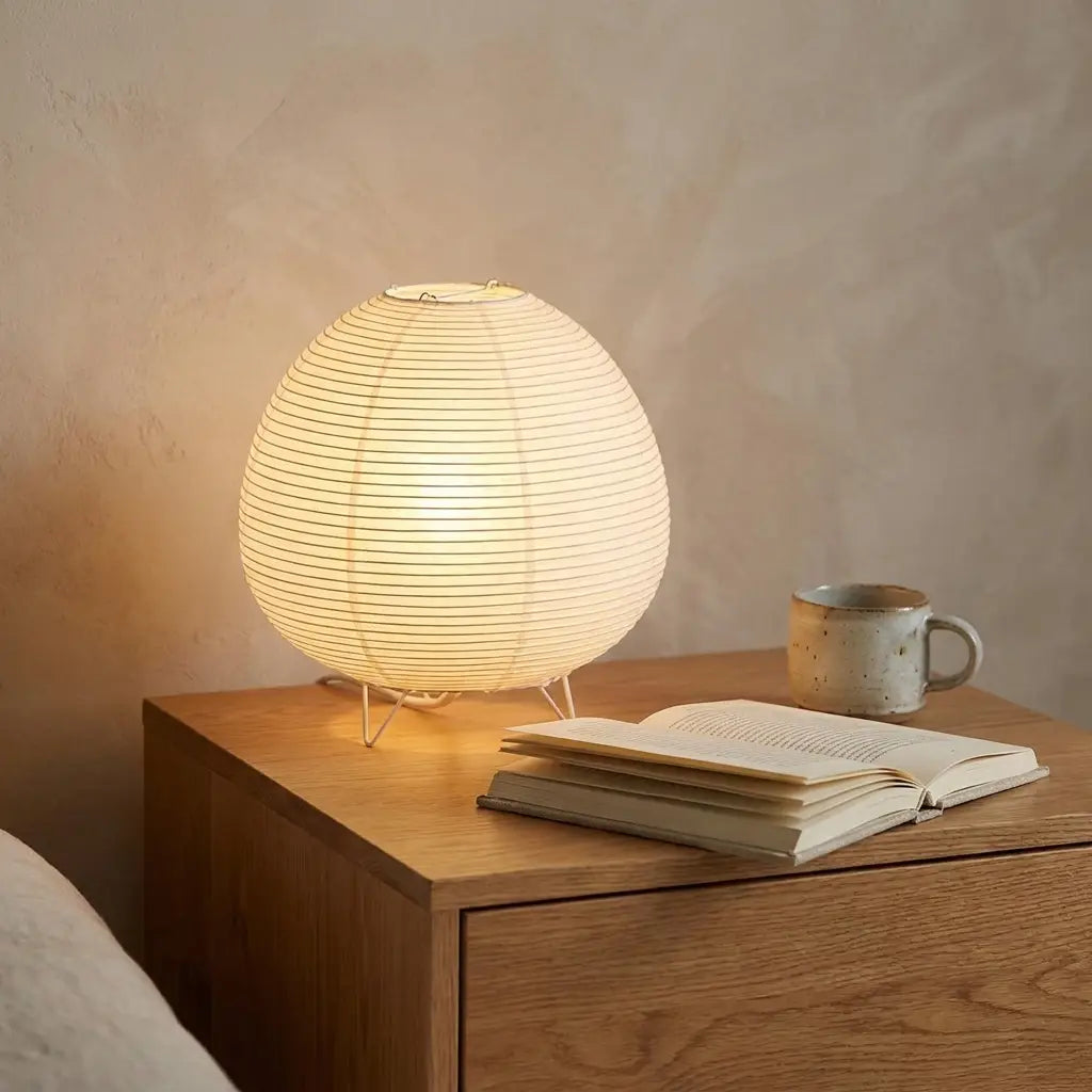 Japanese andon paper lantern table lamp — on solid oak nightstand