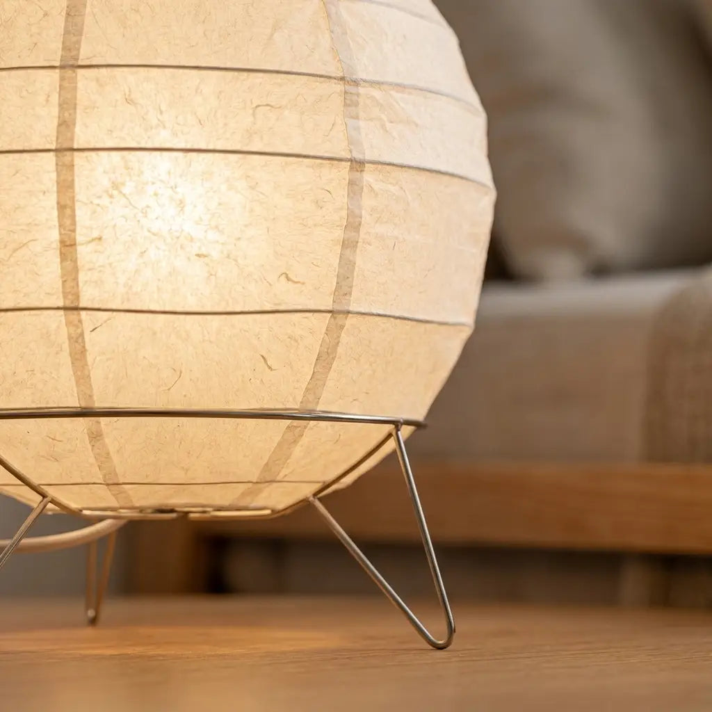 Japanese andon paper lantern table lamp — on minimal walnut desk