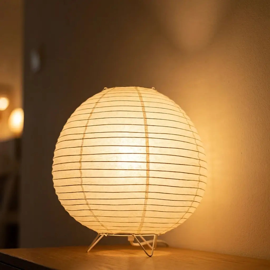 Japanese andon paper lantern table lamp — dramatic low-angle hero shot