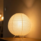 Japanese andon paper lantern table lamp — dramatic low-angle hero shot