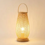 Japanese bamboo bedside table lamp — on warm cream studio backdrop