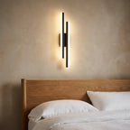 Copper-line LED wall sconce — on textured plaster wall product shot