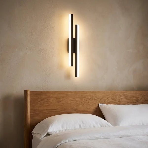 Copper-line LED wall sconce — on textured plaster wall product shot