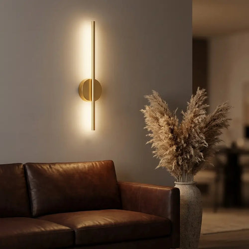 Cordless USB wall sconce — above leather sofa as living-room accent