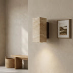 Wabi-Sabi travertine wall lamp — in modern entryway hallway