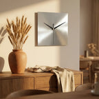 Stainless steel wall clock — above dining sideboard