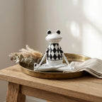 Yoga frog figurine — on oak entryway console