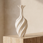 Sculptural metal swirl vase, low-angle hero shot