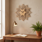 Wood lotus wall clock above a desk in a warm home study