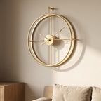 Dial-free gold-tone wall clock showing the wall through its open frame