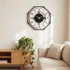 Geometric octagonal metal wall clock on a warm living room wall