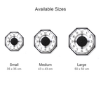 Size guide for the octagonal metal wall clock: Small 35 x 35 cm, Medium 43 x 43 cm, Large 50 x 50 cm