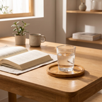 Stack of round bamboo trays in graduated sizes on a linen runner