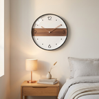 Modern Nordic wall clock with walnut band and quarter numerals, rose-gold hands, in a bedroom