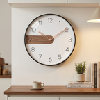 Modern Nordic wall clock with walnut accent and full numerals, rose-gold hands, in a kitchen