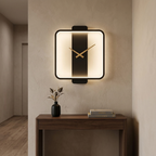Black square clock wall lamp with gold hands above a hallway console table