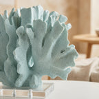 Close-up of the speckled matte texture on the mint fan coral sculpture's fronds
