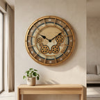 Golden world-map gear wall clock mounted on a beige wall above a wood console with a plant