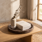 Natural wood tray with a coffee cup and trinket dish on a side table