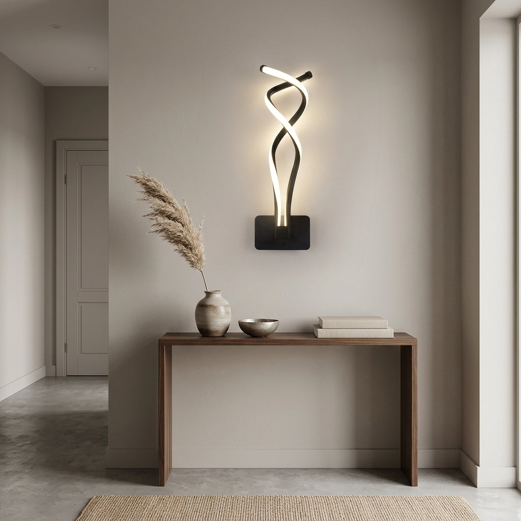 Nordic Twisted-Ribbon LED Wall Sconce in black on a hallway wall