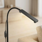 Detail close-up of the gooseneck floor lamp's adjustable reading head