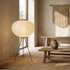 Rice paper lantern floor lamp glowing in a quiet meditation space