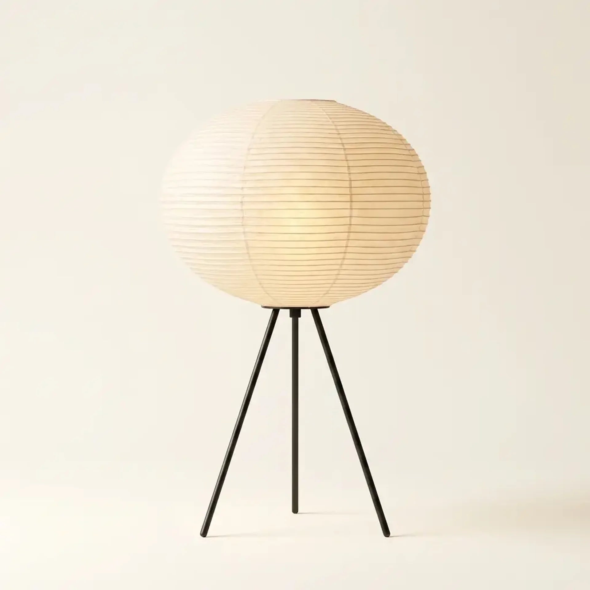 Rice paper lantern floor lamp on warm cream studio backdrop